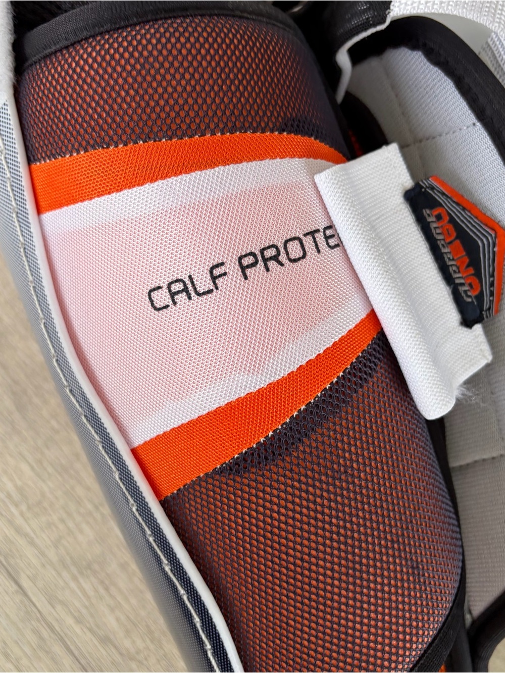 Bauer Supreme One60 Hockey Shin Guards Senior 15" protective Gear White Orange - Picture 10 of 13